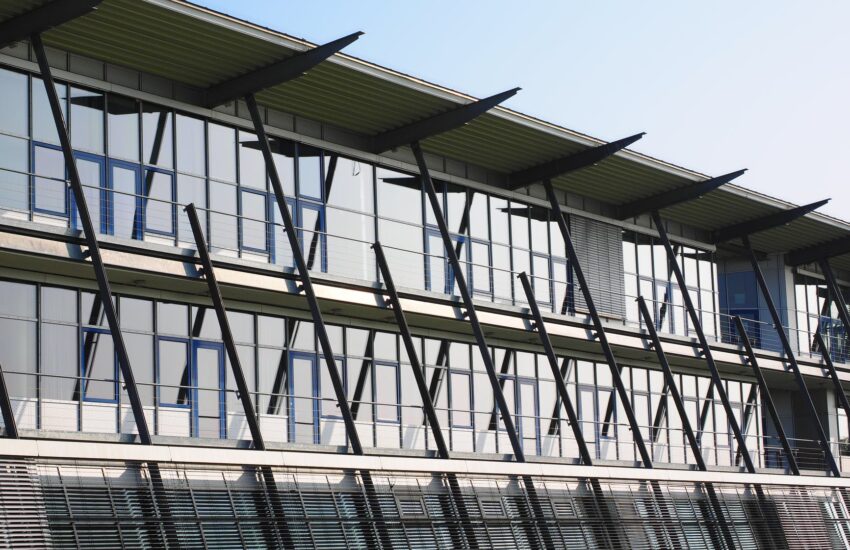 low angle view of office building against sky